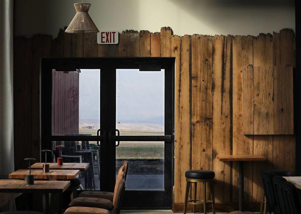 Planks from the family’s 100-year old barn have been incorporated into the decoration of the new business. Bob Brawdy/bbrawdy@tricityherald.com