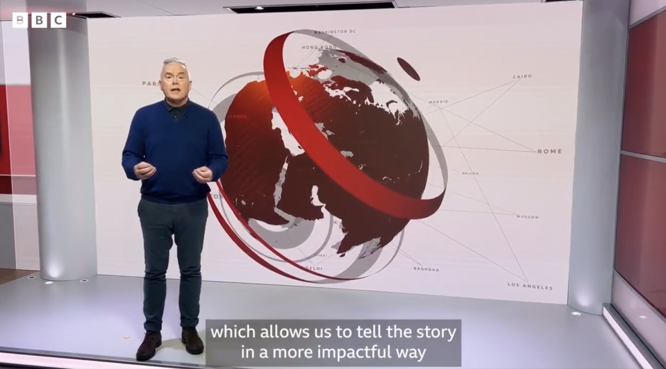 Huw Edwards wore a polo neck in place of his suit to show off the new BBC News studio. (BBC)