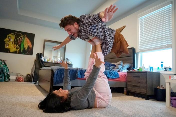 Brody Roybal, who is missing the bottom half of his body, with his girlfriend at home in Smyrna, Tennessee, before beginning his third Paralympics Games (Adam Gray/SWNS)