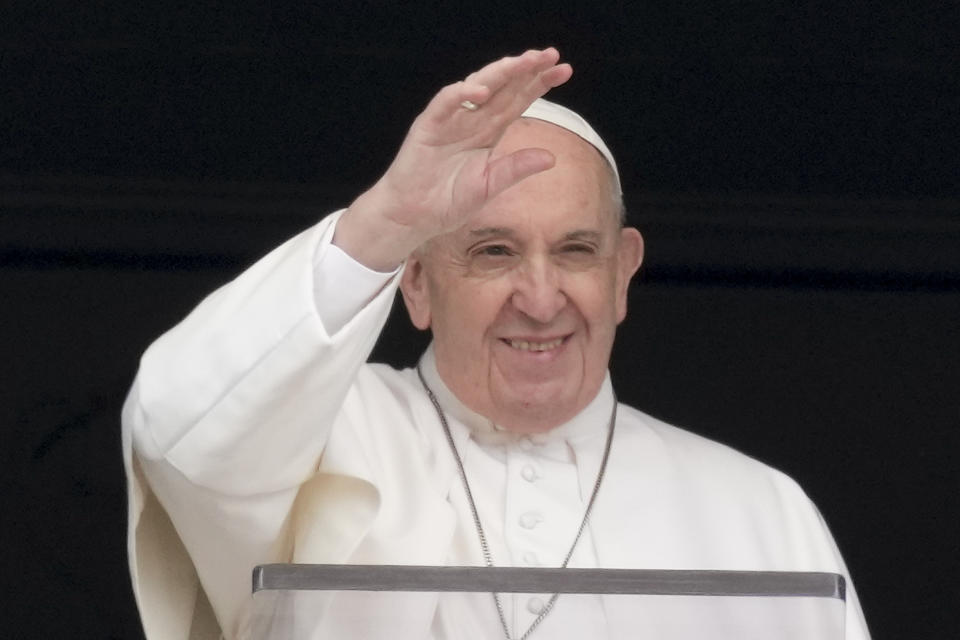 Pope Francis delivers his blessing as he recites the Angelus noon prayer from the window of his studio overlooking St.Peter's Square, at the Vatican, Sunday, May 30, 2021. (AP Photo/Andrew Medichini)