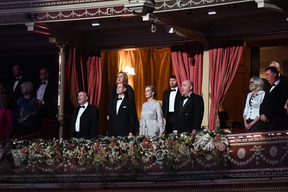 Prince Edward and Countess Sophie (centre) stand during the national anthem (ITV)