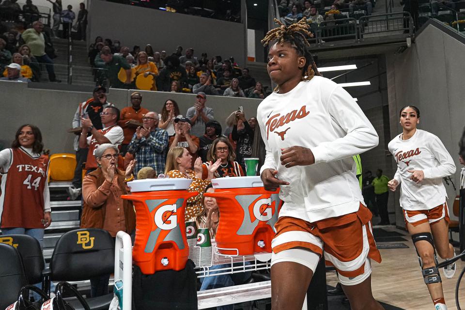 Texas forward DeYona Gaston takes the court ahead of Thursday night's game. The senior had not played since Jan. 13 because of an ankle injury but ended up playing eight minutes off the bench in the first half. She finished with four points and three rebounds.