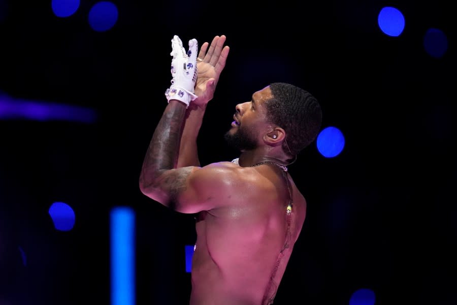 Usher performs during halftime of the NFL Super Bowl 58 football game between the San Francisco 49ers and the Kansas City Chiefs, Sunday, Feb. 11, 2024, in Las Vegas. (AP Photo/Ashley Landis)