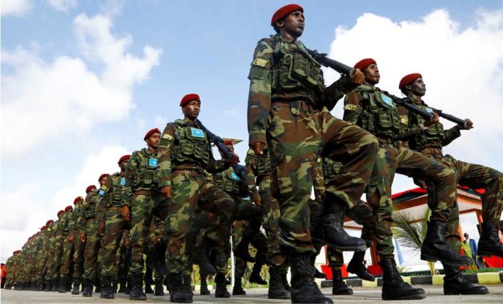 Somali military officers march in a parade during celebrations to mark the 62nd anniversary of the Somali National Armed Forces in Mogadishu, Somalia April 12, 2022