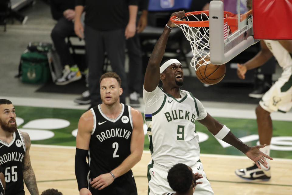 Milwaukee Bucks' Bobby Portis dunks during the first half of an NBA basketball game against the Brooklyn Nets Tuesday, May 4, 2021, in Milwaukee. (AP Photo/Aaron Gash)