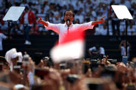 Indonesia's incumbent presidential candidate Joko Widodo gestures as he speaks during a campaign rally at Gelora Bung Karno stadium in Jakarta, Indonesia, April 13, 2019. REUTERS/Willy Kurniawan