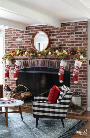 <p><a href="https://inspiredbycharm.com/red-and-rustic-christmas-mantel/" data-component="link" data-source="inlineLink" data-type="externalLink" data-ordinal="1">Inspired by Charm</a></p>