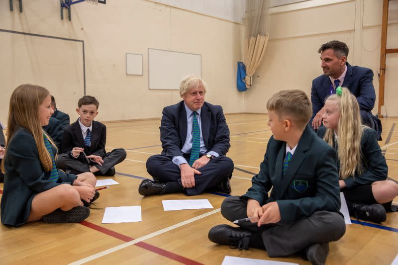 FILE PHOTO: Britain's Prime Minister Boris Johnson visits Castle Rock school on the pupil's first day back to school, in Coalville