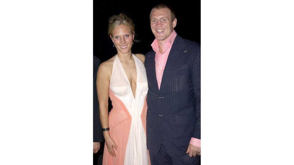 Zara Tindall in a pink sheer dress with Mike Tindall