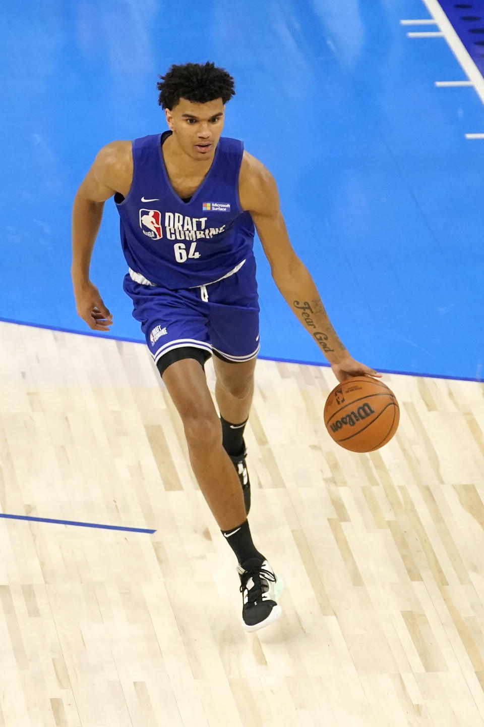 Dominick Barlow participates in the NBA basketball draft combine Wednesday, May 18, 2022, in Chicago. Barlow is one of the 76 prospects at the combine. But he didn't take the conventional route through the college ranks. Or the NBA's G League Ignite. Or playing overseas. He turned down college offers to receive on-the-job training through Overtime Elite, a new basketball league created to give high school players another path to the pros. He got paid -- a six-figure salary -- as he learned about nutrition, social-media skills, financial literacy and, of course, the art of basketball. (AP Photo/Charles Rex Arbogast)