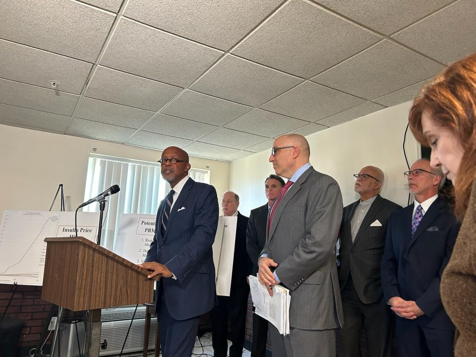Attorney Melvin Butch Hollowell, at the podium, speaks Feb. 7, 2024, in Detroit after four metro Detroit counties file federal lawsuits alleging illegal price fixing of insulin. He is with attorney Mark Bernstein and leaders from Detroit, Macomb, Wayne and Monroe counties.