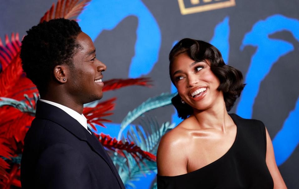 US model Lori Harvey (R) and British actor Damson Idris attend the premiere for the final season of “Snowfall” at The Ted Mann Theater in Los Angeles, California, on February 15, 2023. (Photo by Michael Tran / AFP) (Photo by MICHAEL TRAN/AFP via Getty Images)