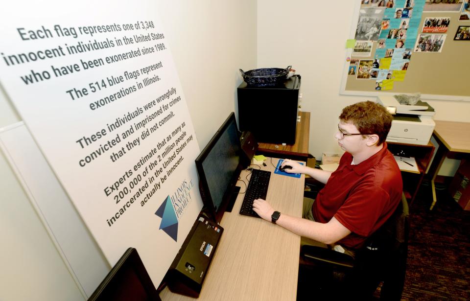 Illinois Innocence Project student intern Caleb Grover works at the Illinois Innocence Project office at the University of Illinois Springfield March 27, 2024.