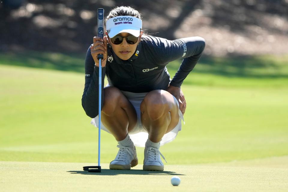 Alison Lee lines up a putt on the third green during the final round of the LPGA CME Group Tour Championship golf tournament, Sunday, Nov. 19, 2023, in Naples, Fla. (AP Photo/Lynne Sladky)