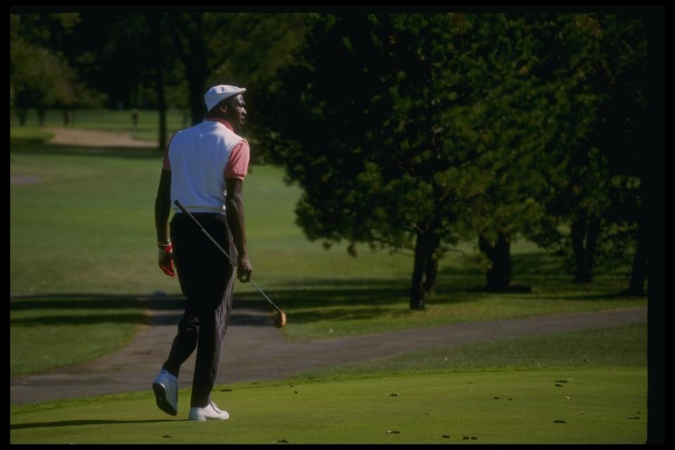 Michael Jordan wears clothes that fit at a golfing event in 1989. (Getty Images)