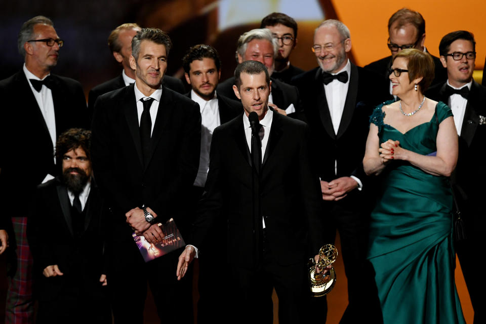 LOS ANGELES, CALIFORNIA - SEPTEMBER 22: D. B. Weiss (C, speaking), David Benioff (3rd L) and cast and crew of 'Game of Thrones' accept the Outstanding Drama Series award onstage during the 71st Emmy Awards at Microsoft Theater on September 22, 2019 in Los Angeles, California. (Photo by Kevin Winter/Getty Images)