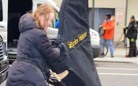 Harpist Erin Hill arrives at the hotel - Credit: Splash