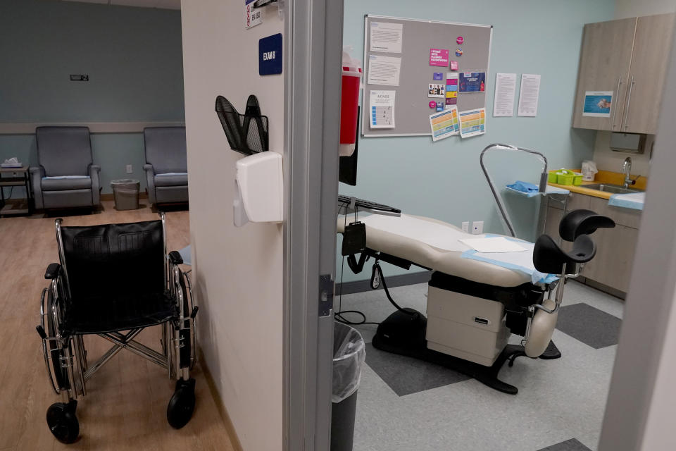 FILE - An unoccupied recovery area, left, and an abortion procedure room are seen at a Planned Parenthood Arizona facility in Tempe, Ariz., on June 30, 2022. On Friday, Dec. 30, 2022, the Arizona Court of Appeals concluded that abortion doctors can't be prosecuted under a pre-statehood law that criminalizes nearly all abortions. One year ago, the U.S. Supreme Court rescinded a five-decade-old right to abortion, prompting a seismic shift in debates about politics, values, freedom and fairness. (AP Photo/Matt York, File)