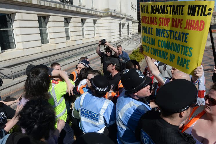 EDL members and anti-fascist protestors clash (PA)