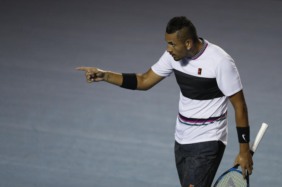 Australia's Nick Kyrgios points toward the back of the court in his Mexican Tennis Open final match against Germany's Alexander Zverev, in Acapulco, Mexico, Saturday, March 2, 2019. (AP Photo/Rebecca Blackwell)