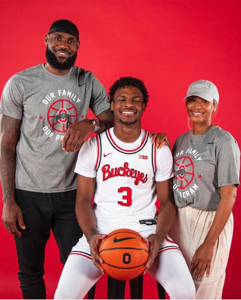 Bronny James poses for a photo with his parents LeBron and Savannah while on an unofficial visit to Ohio State on Sept. 3, 2022.