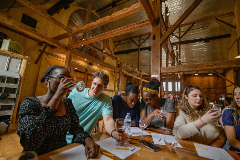 Customers enjoy the wine at Bishop Estate Vineyard and Winery in Perkasie.