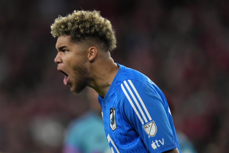 Minnesota United goalkeeper Dayne St. Clair celebrates a 1-0 victory over St. Louis City following an MLS soccer match Saturday, April 1, 2023, in St. Louis. (AP Photo/Jeff Roberson)