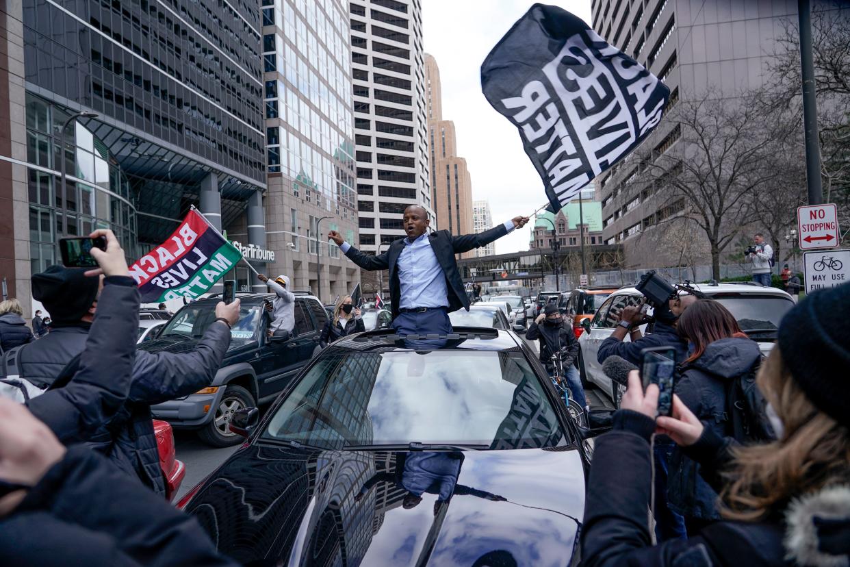 <p>People rally outside the courthouse in Minneapolis on 20 April, 2021, after the guilty verdicts were announced in the trial of former Minneapolis police officer Derek Chauvin in the death of George Floyd</p> (AP)