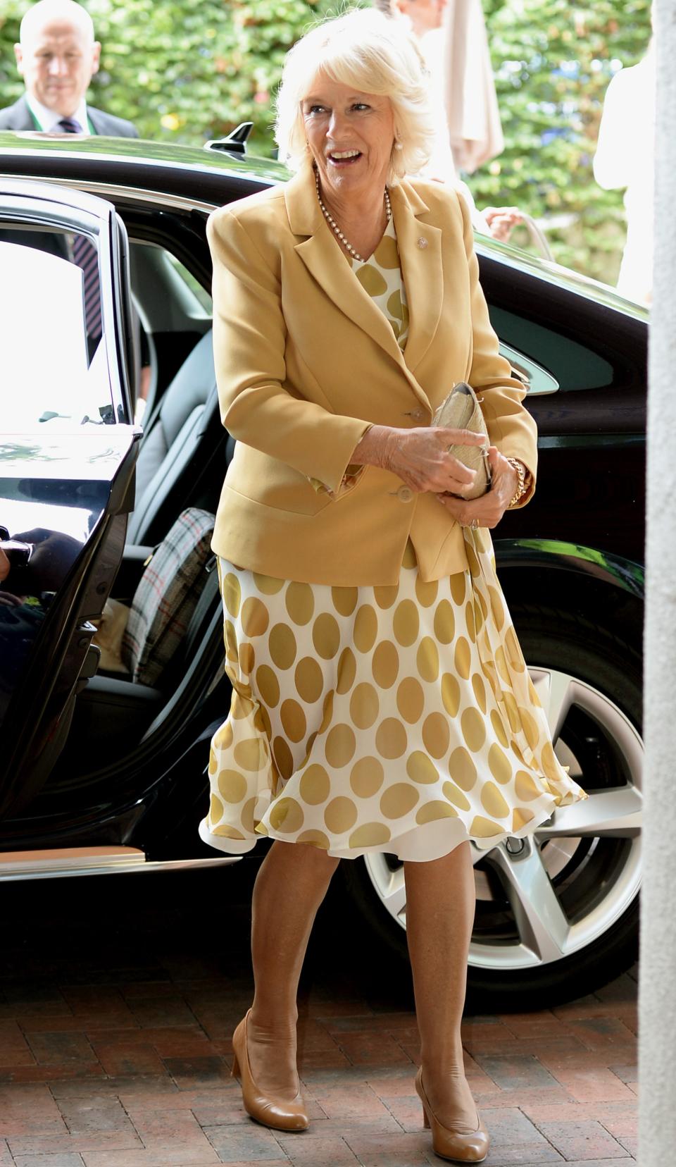 LONDON - JUNE 25: Camilla, Duchess of Cornwall arrives for day three of the Wimbledon Championships at the All England Lawn Tennis and Croquet Club, Wimbledon on June 25, 2014 in London, England. (Photo by Anthony Devlin - WPA Pool/Getty Images)