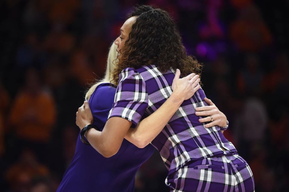 Tennessee women's basketball coach Kellie Harper and Kentucky women's basketball coach Kyra Elzy hug before the start of the NCAA basketball game between the Tennessee Lady Vols and Kentucky Wildcats in Knoxville, Tenn. on Sunday, January 16, 2022.