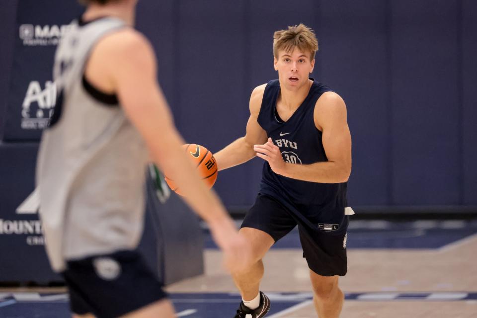 Dallin Hall moves the ball during BYU basketball practice at the Marriott Center Annex Court in Provo on Tuesday, Oct. 3, 2023. Hall was one of three BYU players to represent the team at Big 12 Men’s Basketball Tipoff on Wednesday. | Spenser Heaps, Deseret News