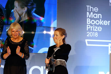 Britain's Camilla, the Duchess of Cornwall presents the Man Booker Prize for Fiction 2018 to British writer Anna Burns during the prize's 50th year, at the Guildhall in London, Britain, October 16, 2018. Frank Augstein/Pool via REUTERS