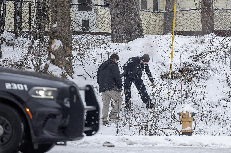 Police and the BCA at the scene where two people were shot and killed Monday night at a Super 8 hotel in Cloquet, Minn., on Tuesday, Jan. 9, 2024. (Elizabeth Flores/Star Tribune via AP)