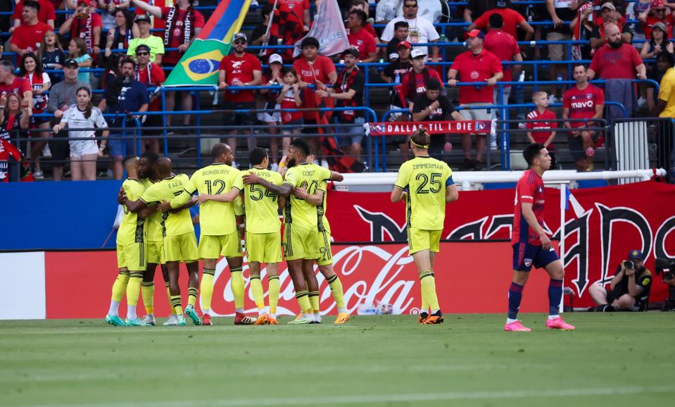 Jun 3, 2023; Frisco, Texas, USA;  Nashville SC defender Shaq Moore (18) celebrates with teammates after scoring a goal during the first half against FC Dallas at Toyota Stadium. Mandatory Credit: Kevin Jairaj-USA TODAY Sports