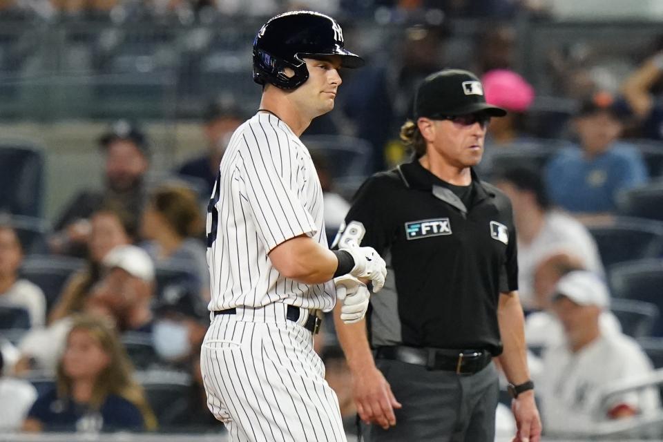 New York Yankees' Andrew Benintendi reacts after hitting a fly out during the ninth inning of a baseball game against the Kansas City Royals Thursday, July 28, 2022, in New York. The Yankees won 1-0. (AP Photo/Frank Franklin II)