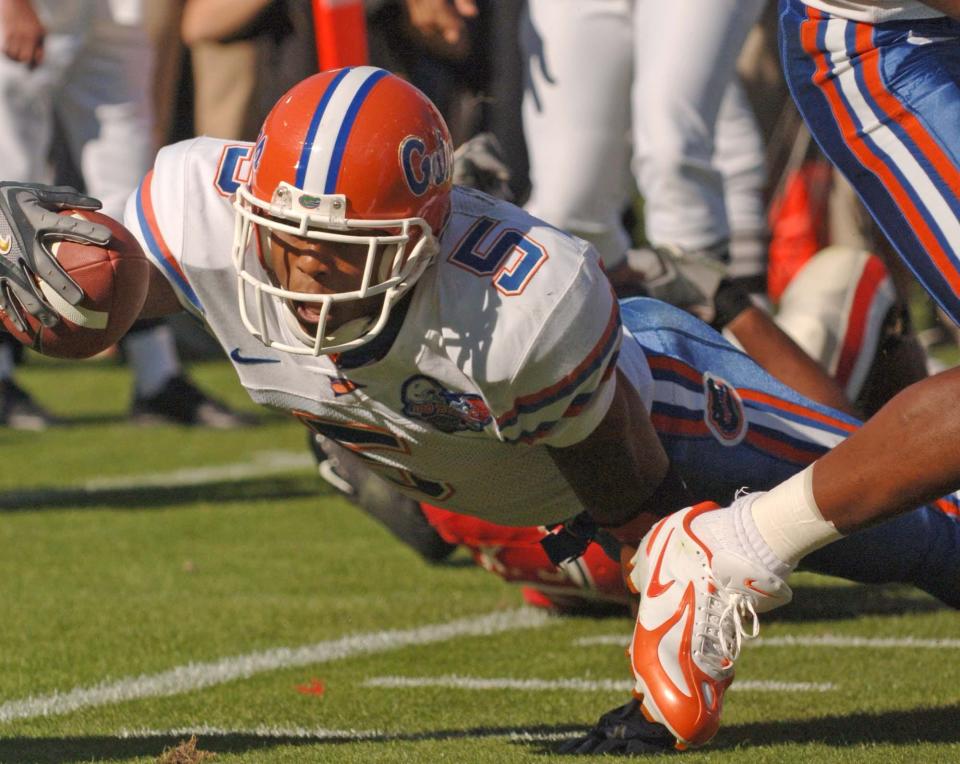 Florida wide receiver Andre Caldwell dives into the end zone for a touchdown during the 2006 Georgia-Florida game at TIAA Bank Field.