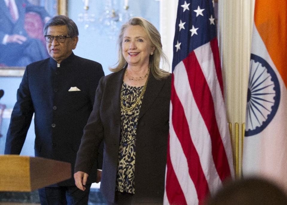 Secretary of State Hillary Rodham Clinton and Indian Foreign Minister S.M. Krishna walk to a joint news conference, Wednesday, June 13, 2012, at the State Department in Washington. (AP Photo/Manuel Balce Ceneta)