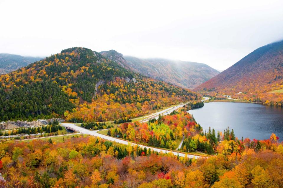 Franconia Notch and Echo Lake, New Hampshire in autumn. Beautiful vibrant fall colors in the foliage.