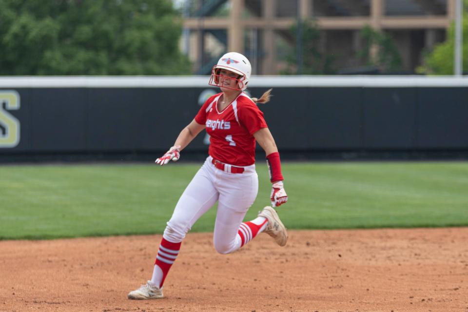 Shawnee Heights Karlyn Bowman (4) runs for third base during the state softball quarterfinals against Bishop Carroll on Thursday, May 25, 2023.