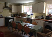 <p>And here’s the kitchen and eating area where you and your friends can enjoy a family-style meal.<br>(Airbnb) </p>