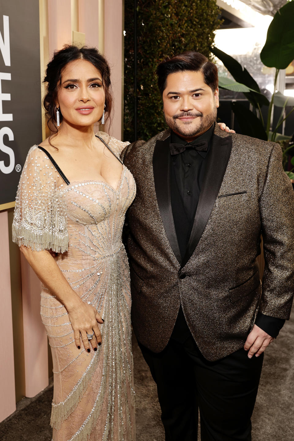 BEVERLY HILLS, CALIFORNIA - JANUARY 10: 80th Annual GOLDEN GLOBE AWARDS -- Pictured: (l-r) Salma Hayek and Harvey Guillen arrive at the 80th Annual Golden Globe Awards held at the Beverly Hilton Hotel on January 10, 2023 in Beverly Hills, California. --  (Photo by Todd Williamson/NBC/NBC via Getty Images)