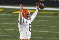 Cleveland Browns quarterback Baker Mayfield (6) celebrates as he walks off the field following a win over the Pittsburgh Steelers in an NFL wild-card playoff football game in Pittsburgh, Sunday, Jan. 10, 2021. (AP Photo/Don Wright)