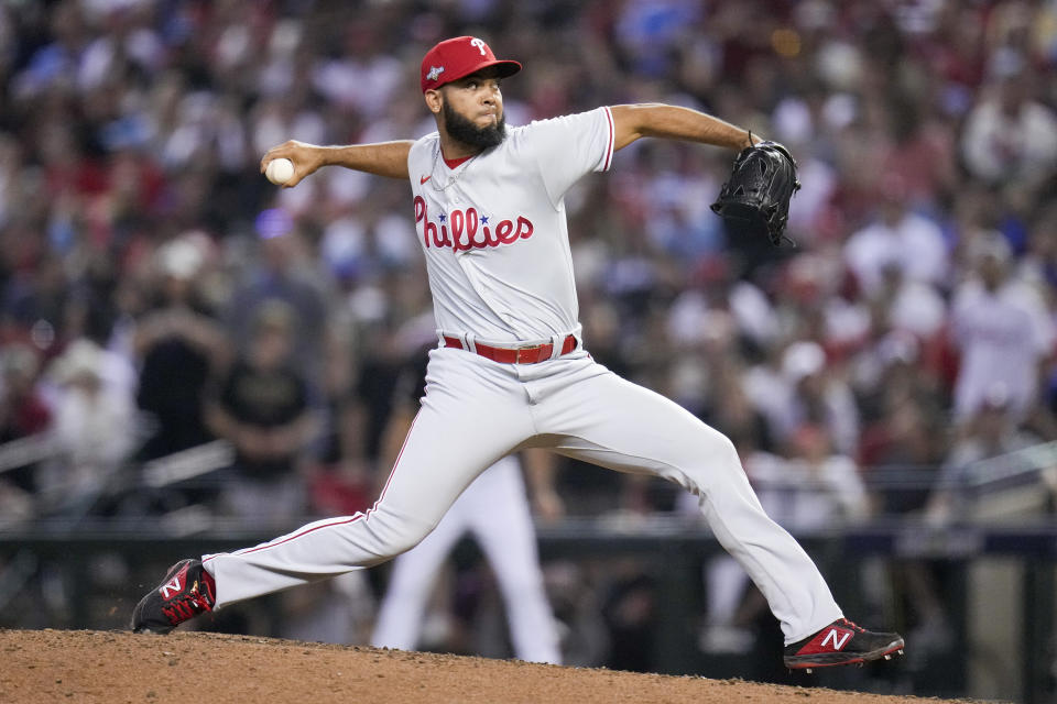 Philadelphia Phillies relief pitcher Seranthony Dominguez throws against the Arizona Diamondbacks during the seventh inning in Game 4 of the baseball NL Championship Series in Phoenix, Friday, Oct. 20, 2023. (AP Photo/Ross D. Franklin)