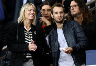 <p>Robin Wright was at the same game as Kourtney, but we don’t think she wanted to kiss her date — except in a mom way. The <em>House of Cards</em> star brought along her son, Hopper Penn. (Photo: Best Image/Backgrid) </p>