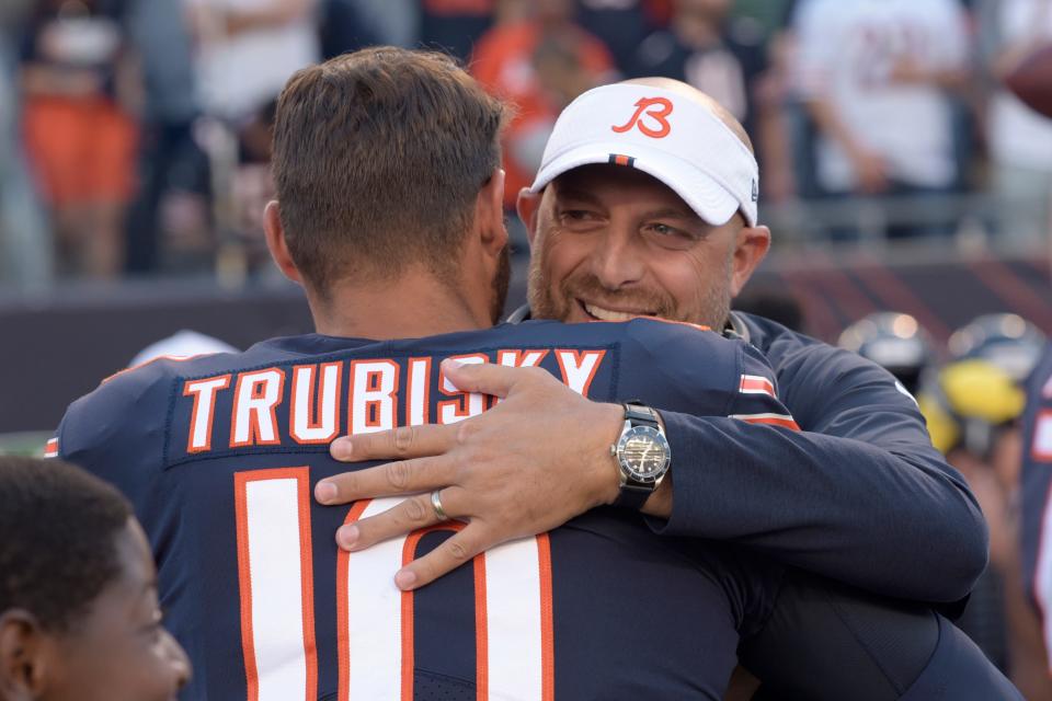 Bears coach Matt Nagy hugs quarterback Mitchell Trubisky before a preseason game in 2019.