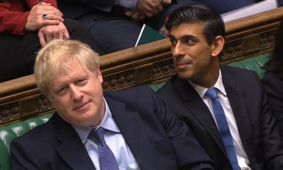 Boris Johnson and his new chancellor, Rishi Sunak, listen to Javid’s statement.