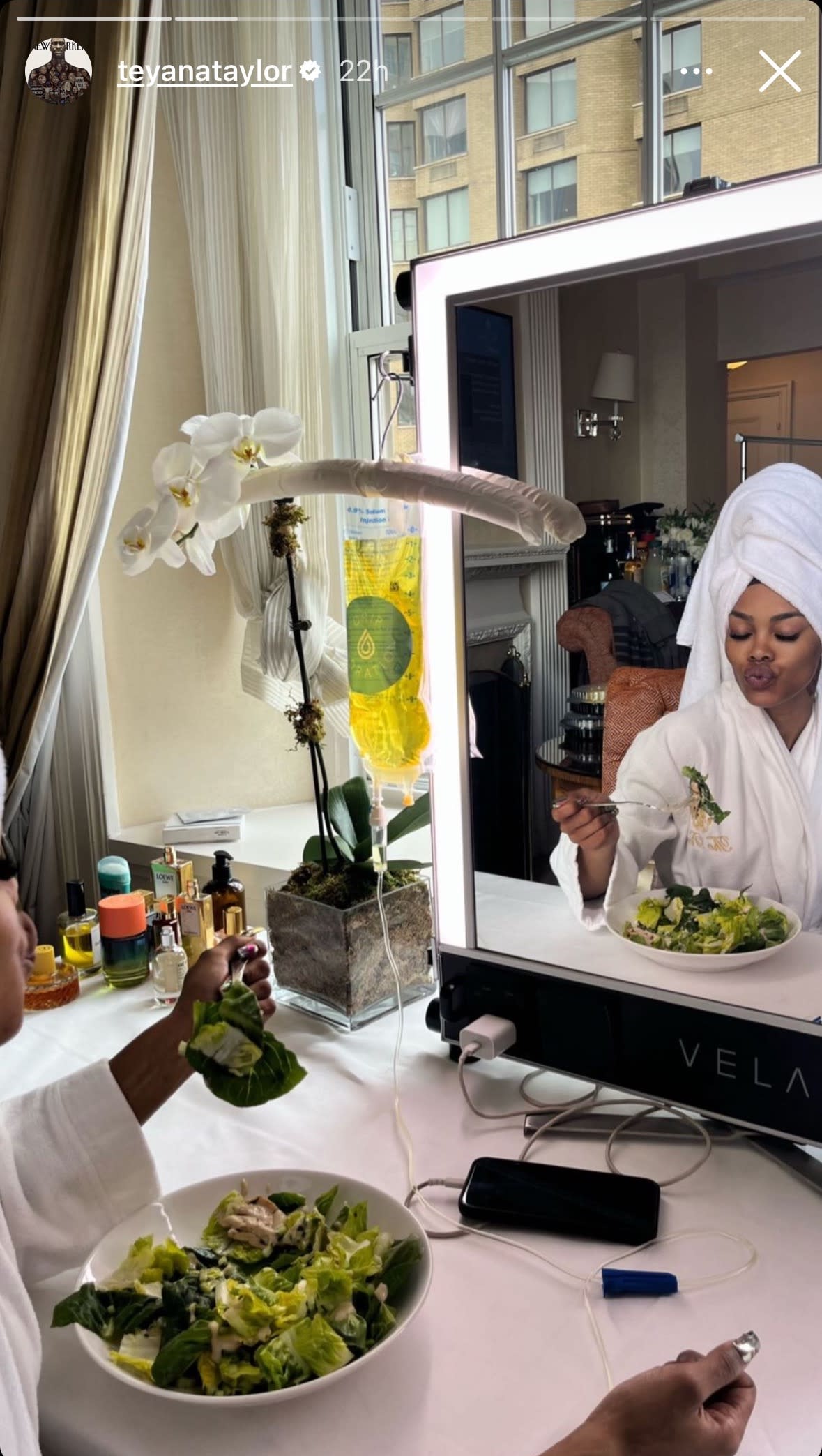 Teyana Taylor with a salad and IV drip. (@teyanataylor via Instagram)