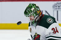 Minnesota Wild goaltender Kaapo Kahkonen makes a save against the Arizona Coyotes during the second period of an NHL hockey game Friday, March 5, 2021, in Glendale, Ariz. (AP Photo/Rick Scuteri)