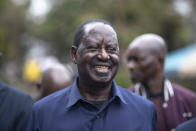 Presidential candidate Raila Odinga arrives to attend Sunday mass in St. Francis church in Nairobi, Kenya, Sunday, Aug. 14, 2022. The race remains close between Odinga and Deputy President William Ruto as the electoral commission physically verifies more than 46,000 results forms electronically transmitted from around the country. (AP Photo/Mosa'ab Elshamy)