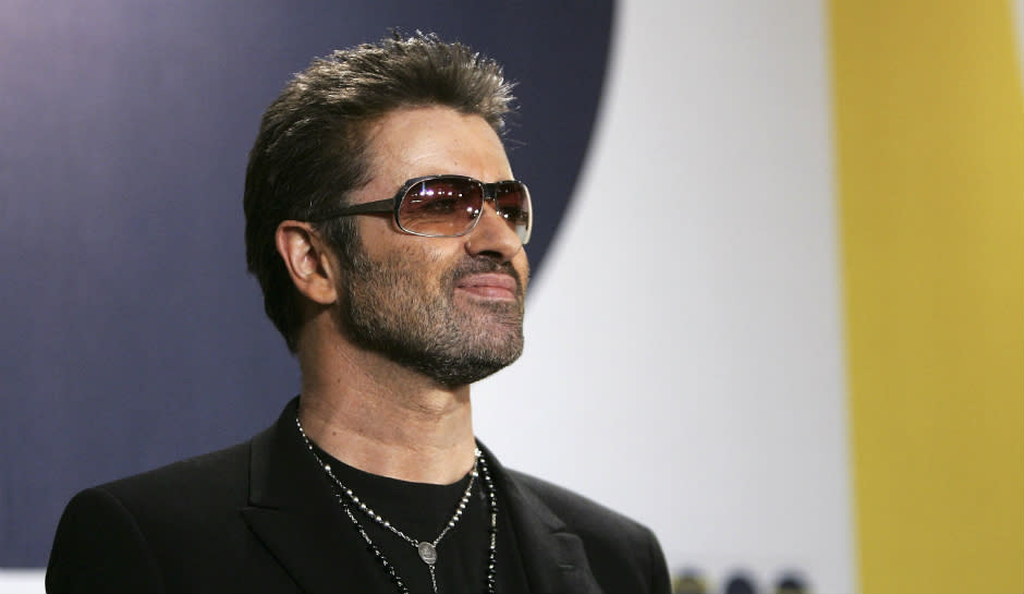 Singer George Michael poses at the 'George Michael: A Different Story' Photocall in 2005